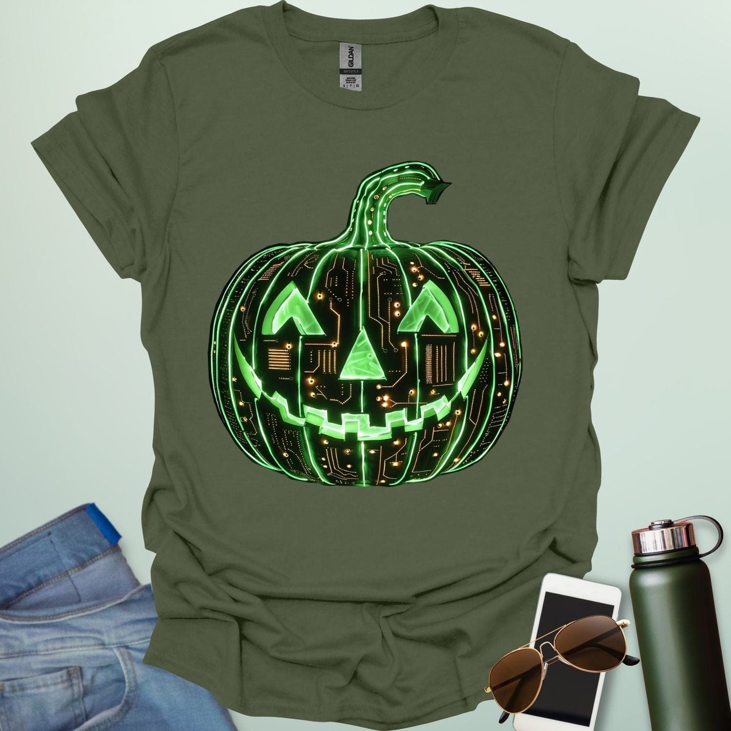 Pumpkin Tech t-shirt with glowing green jack-o-lantern circuit board design — Halloween STEM geek apparel.