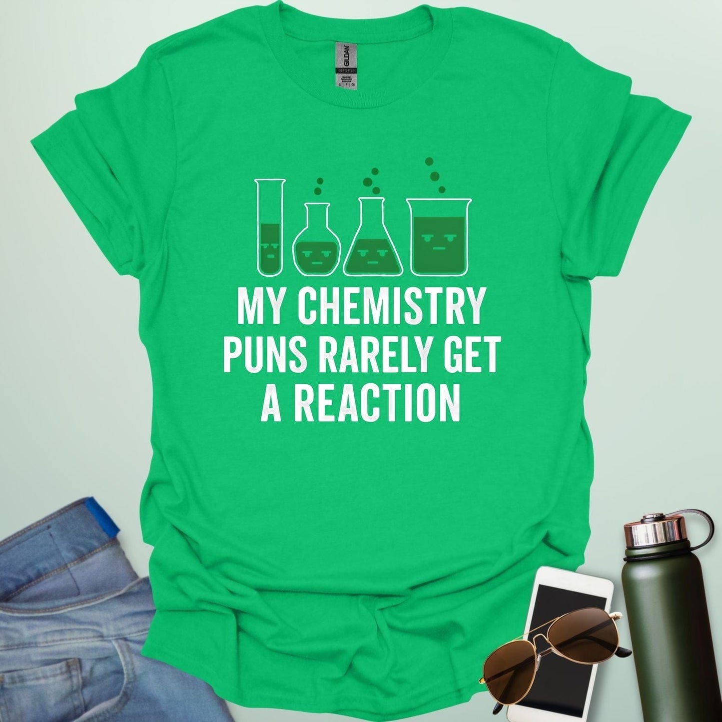 "My Chemistry Puns Rarely Get a Reaction' t-shirt with a humorous science pun design.