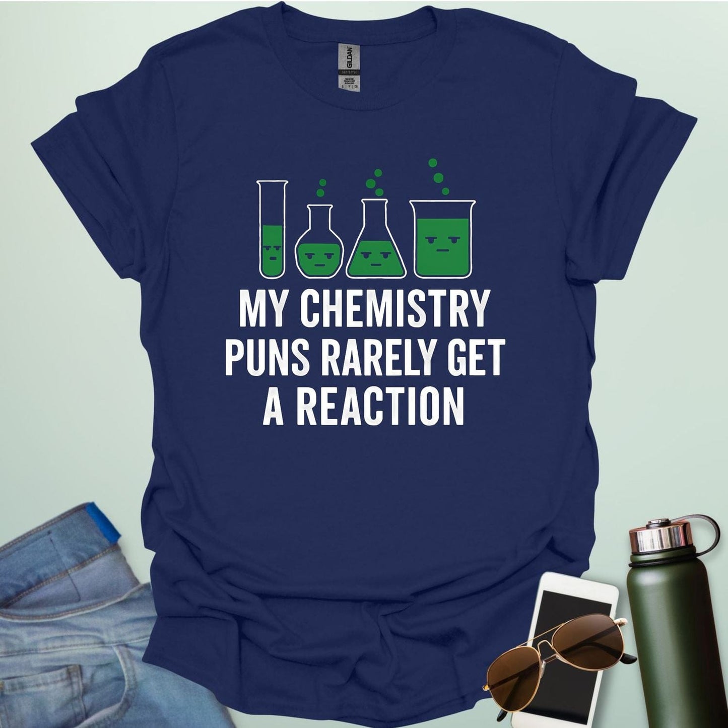 "My Chemistry Puns Rarely Get a Reaction' t-shirt with a humorous science pun design.