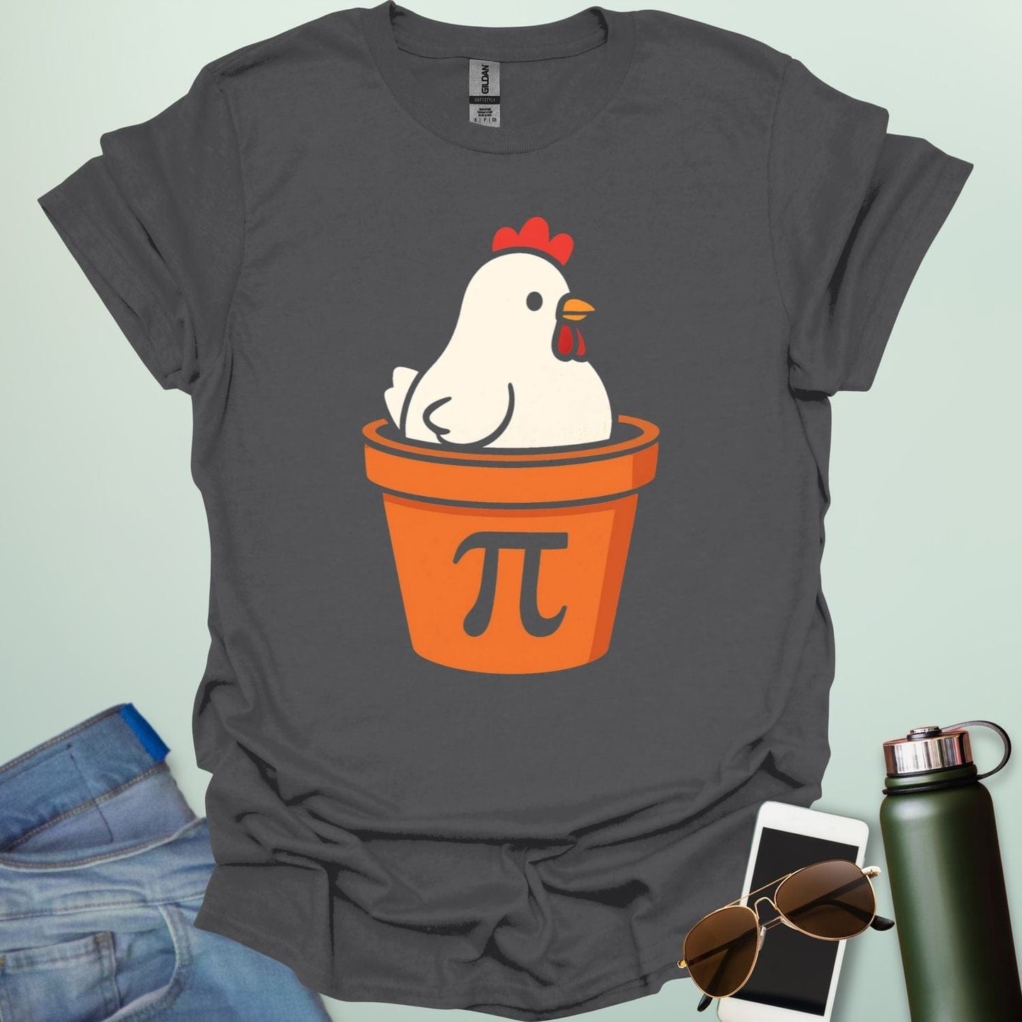 A funny 'Chicken Pot Pi' t-shirt featuring a cartoon chicken in a pot with the Pi symbol.