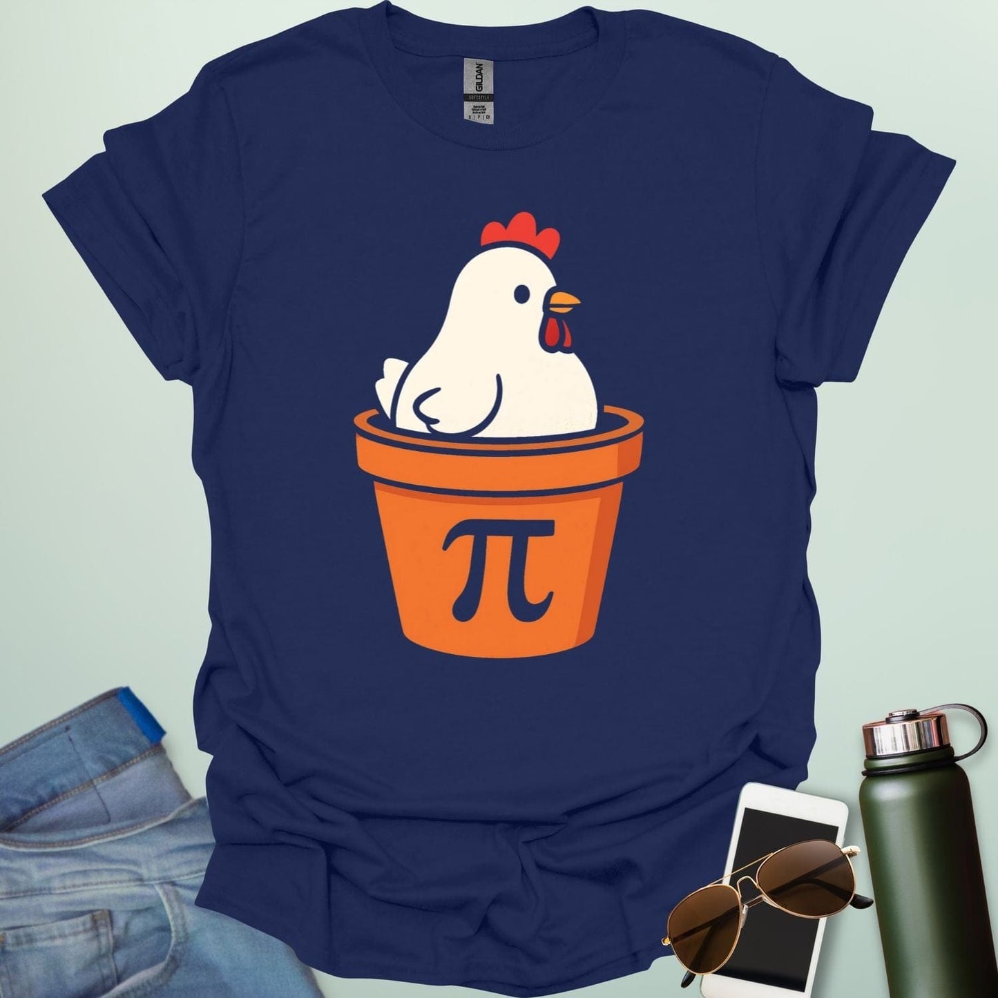 A funny 'Chicken Pot Pi' t-shirt featuring a cartoon chicken in a pot with the Pi symbol.
