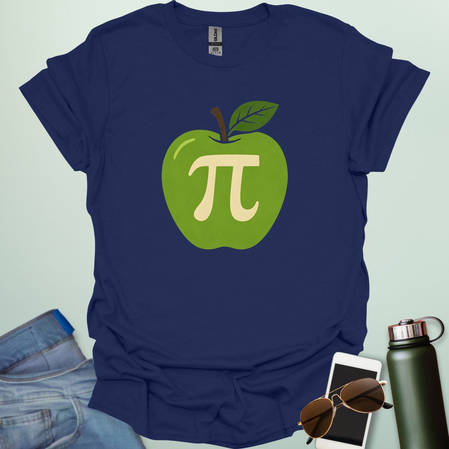 Apple Pi' t-shirt with a green apple graphic and a beige-colored Pi symbol inside.