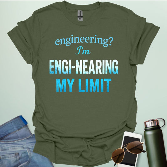'Engineering? I'm Engi-nearing My Limit' t-shirt with a funny, distressed typography design.