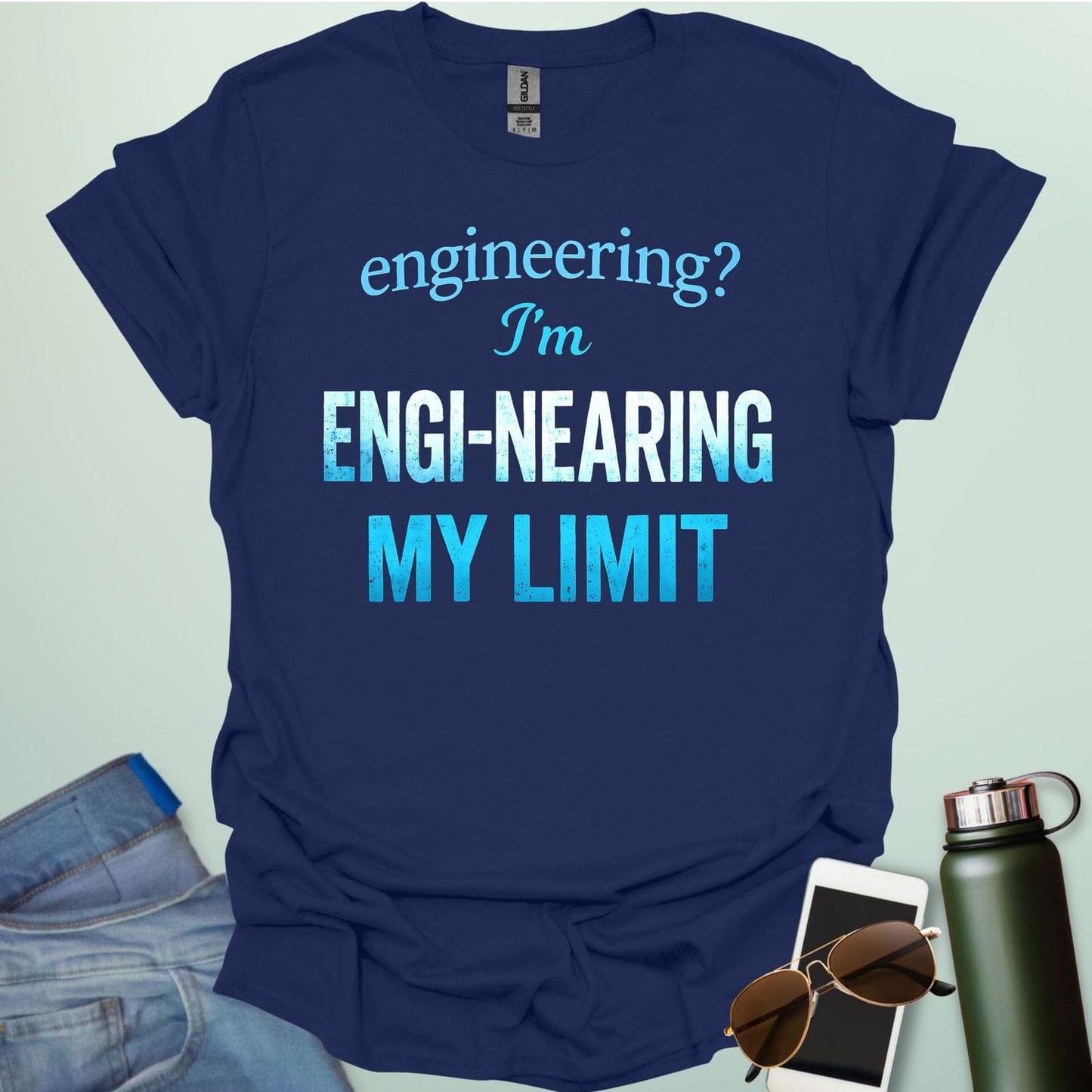 'Engineering? I'm Engi-nearing My Limit' t-shirt with a funny, distressed typography design.