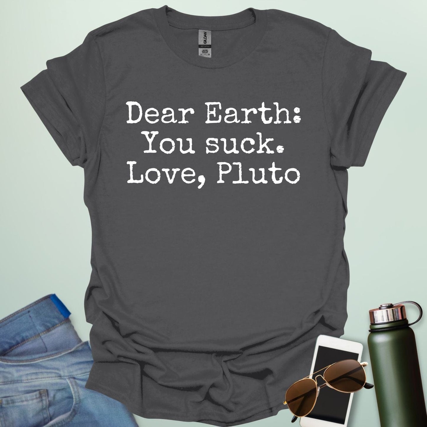 Charcoal Gray t-shirt with humorous text 'Dear Earth: You suck. Love, Pluto'.