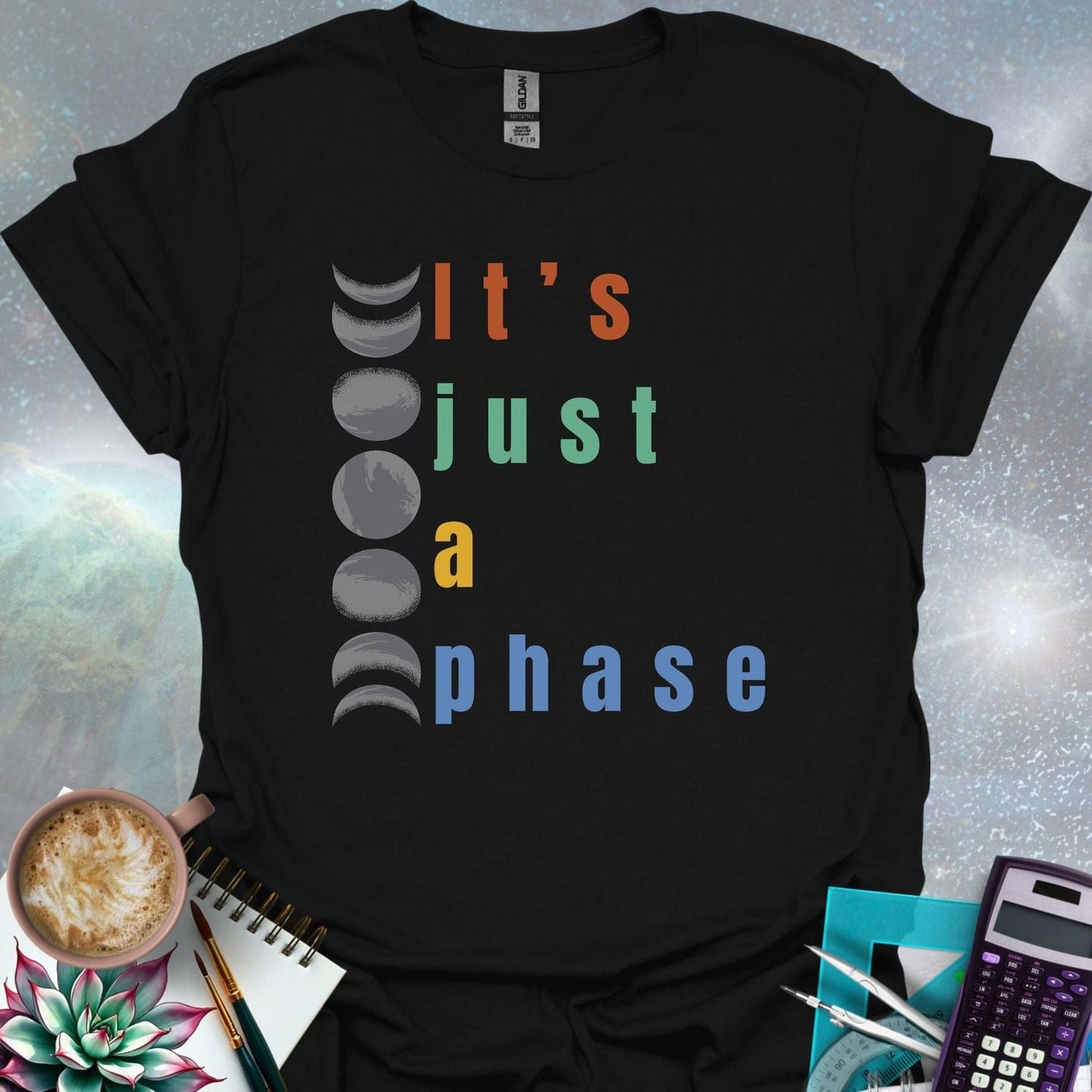 Vertical graphic of the eight moon phases with the text 'It's Just A Phase' in colorful stacked letters.