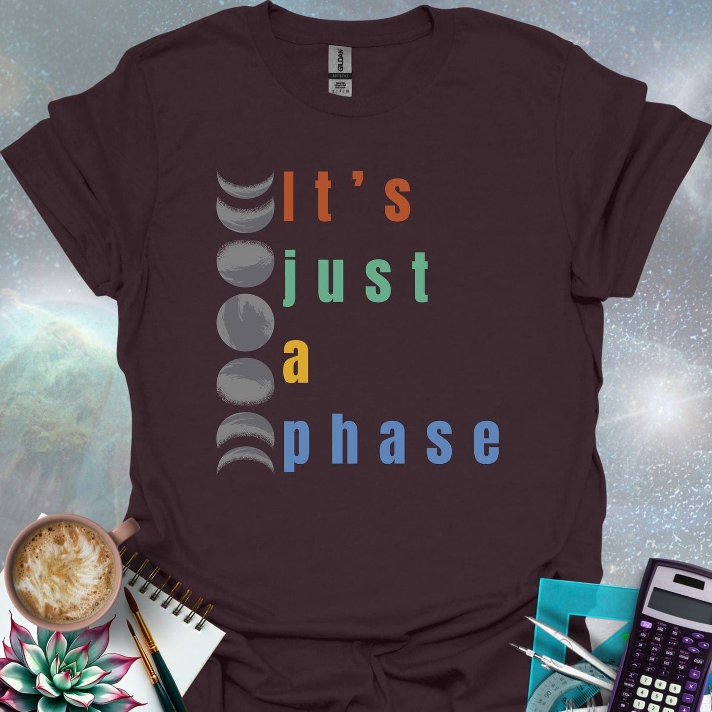 Vertical graphic of the eight moon phases with the text 'It's Just A Phase' in colorful stacked letters.