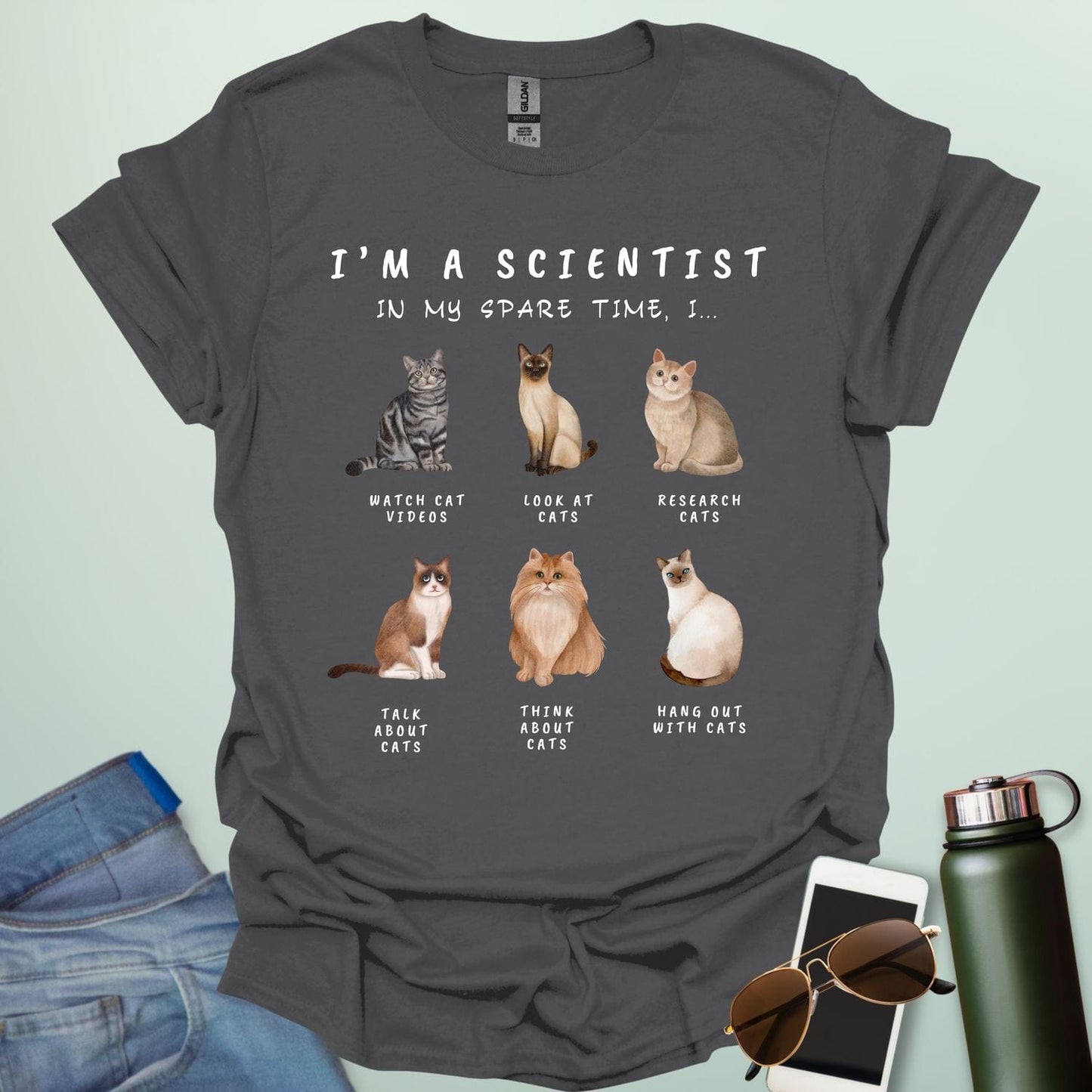 Charcoal Gray t-shirt with cat-themed text and illustrations on a light green background
