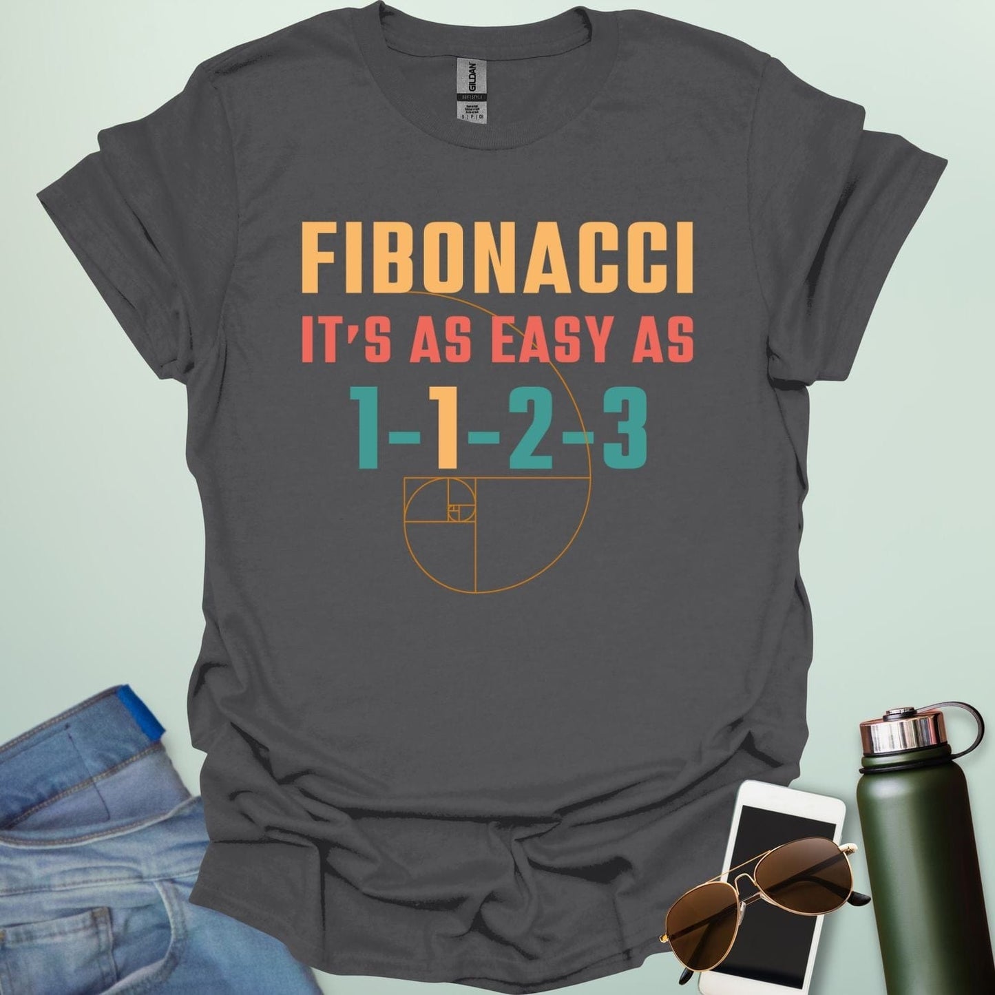 Fibonacci It's As Easy As 1-1-2-3' t-shirt with the Fibonacci spiral graphic.