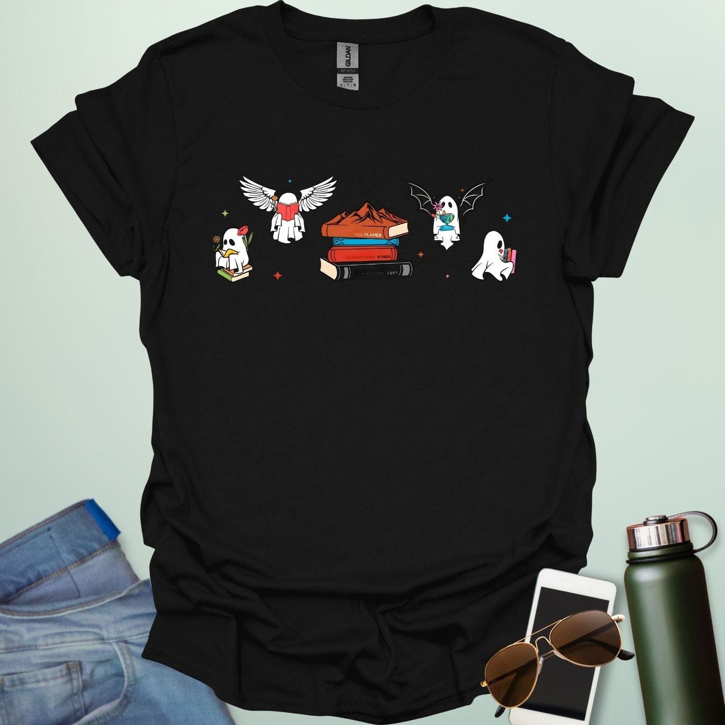 Literate Ghosts t-shirt featuring ghostly characters with books — a funny Halloween design for readers and teachers.
