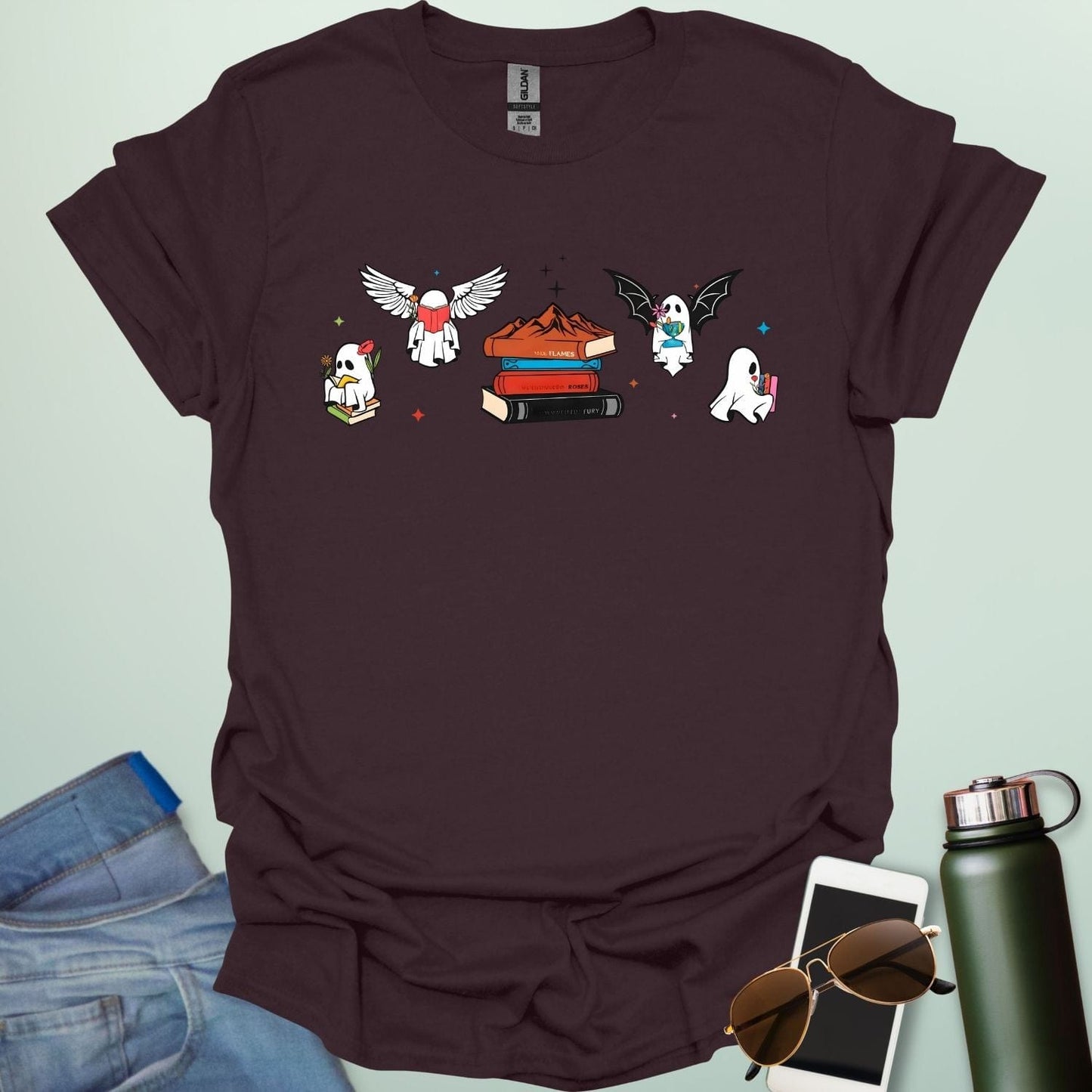 Literate Ghosts t-shirt featuring ghostly characters with books — a funny Halloween design for readers and teachers.