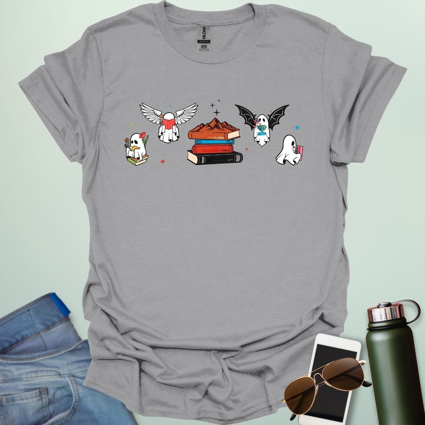 Literate Ghosts t-shirt featuring ghostly characters with books — a funny Halloween design for readers and teachers.