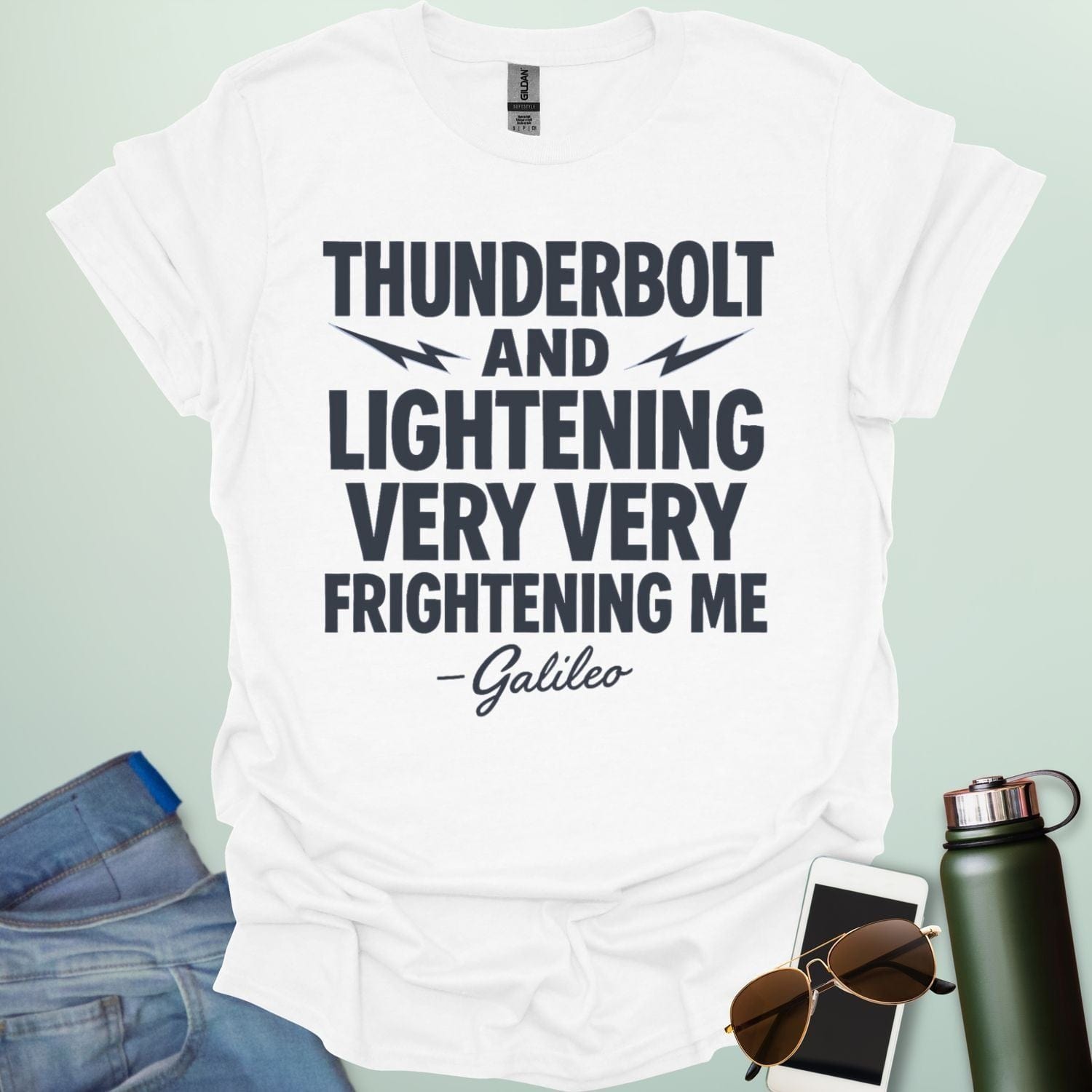 A white t-shirt with the phrase 'THUNDERBOLT AND LIGHTENING VERY VERY FRIGHTENING ME' with lightning bolts, and '- Galileo' in script below.