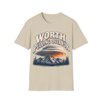 Vintage-style graphic design featuring arched text reading 'WORTH PULLING OVER FOR' above a massive lenticular cloud formation hovering over mountain peaks and pine trees.