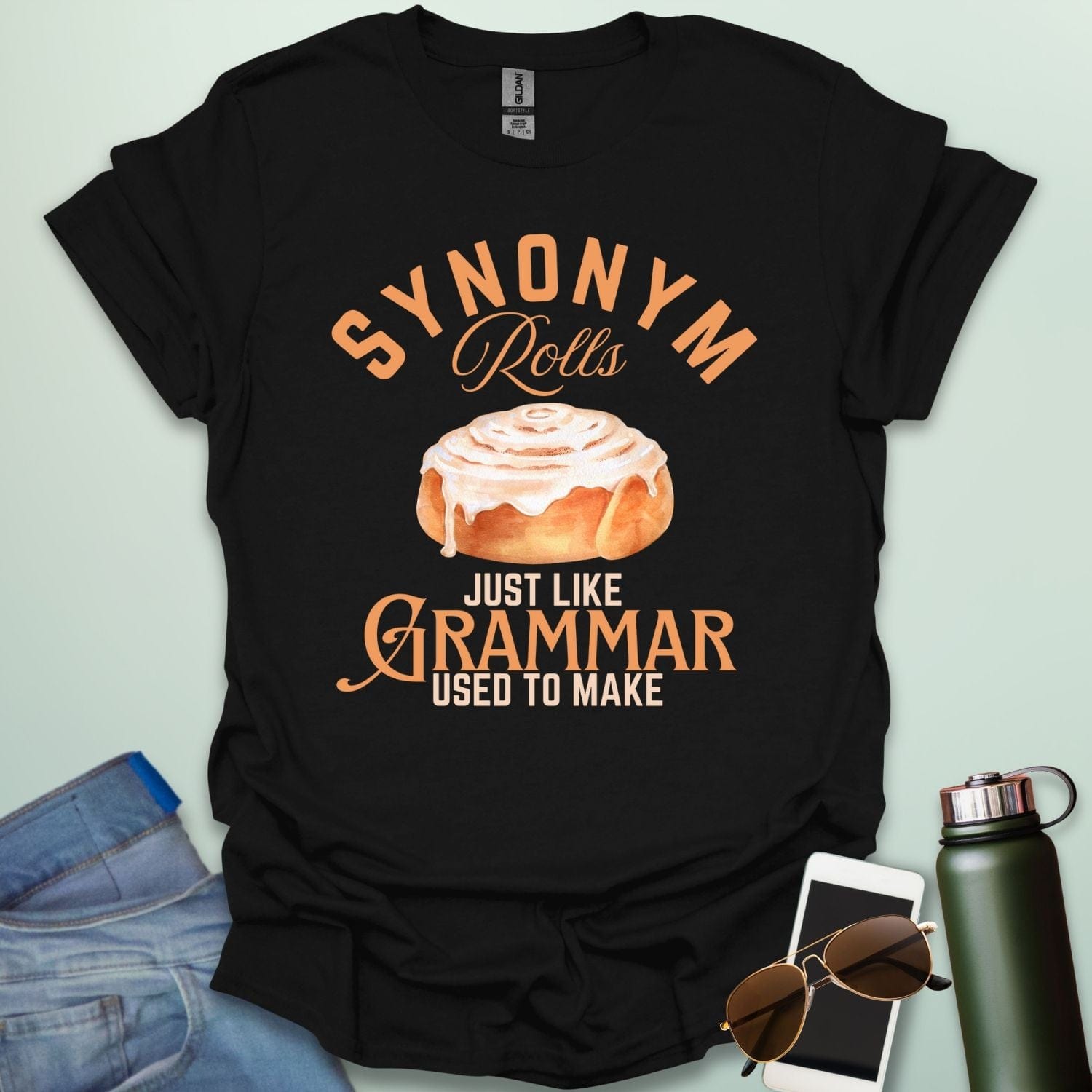 Black t-shirt with the black and white 'Synonym Rolls Just Like Grammar Used to Make' design.
