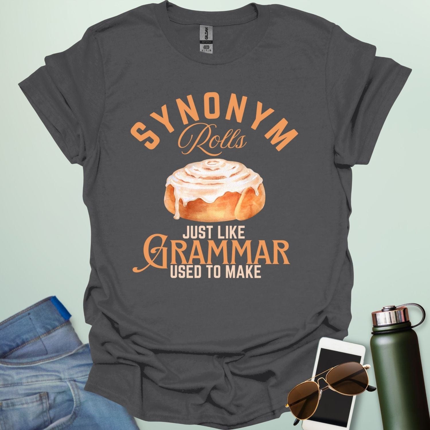 Charcoal gray t-shirt with the black and white 'Synonym Rolls Just Like Grammar Used to Make' design.