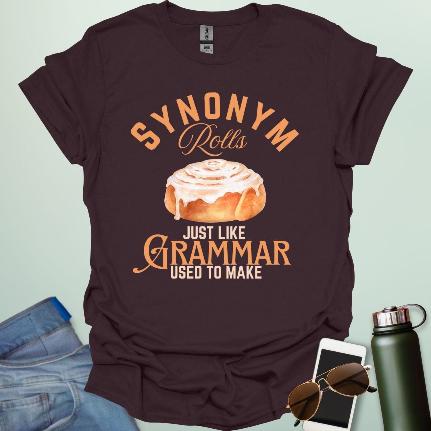 Dark chocolate t-shirt with the black and white 'Synonym Rolls Just Like Grammar Used to Make' design.