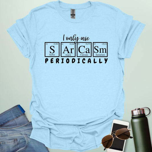 Light blue t-shirt with the white 'I only use Sarcasm Periodically' chemistry pun design.