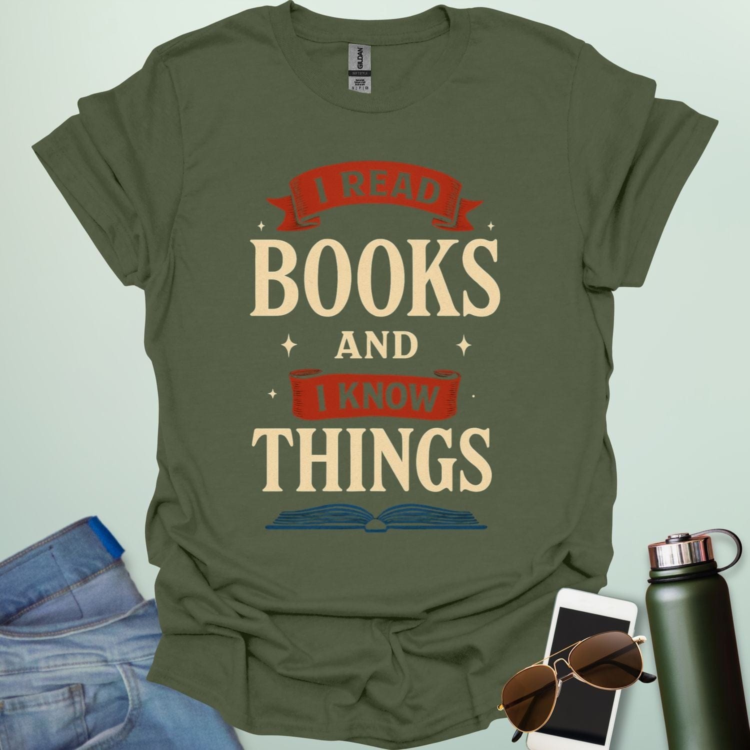 A military green t-shirt with the text 'I READ BOOKS AND I KNOW THINGS' and a graphic of an open book below it.
