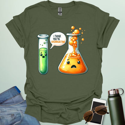 Military green t-shirt with a graphic of two test tubes and a beaker on a light gray background. The test tube says, "I THINK YOU'RE OVERREACTING"