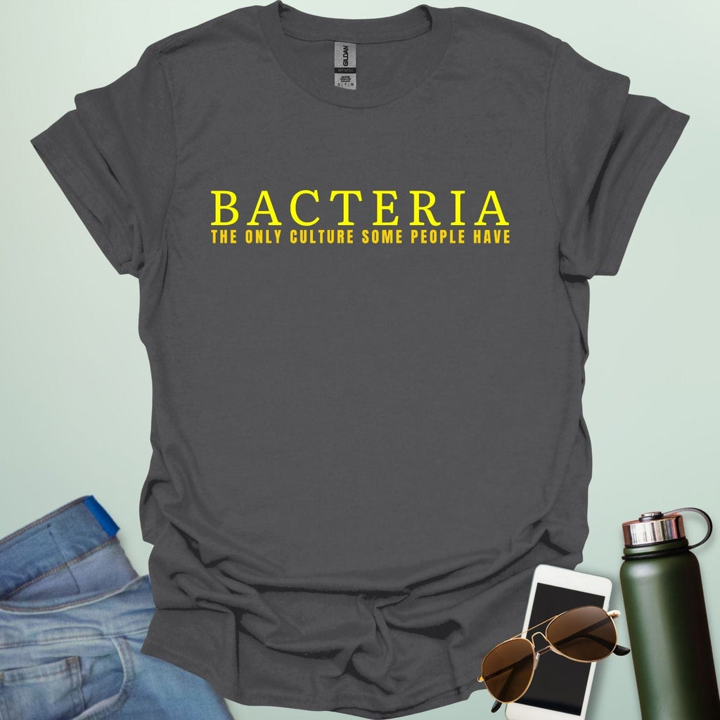 A charcoal grey t-shirt with the text 'BACTERIA THE ONLY CULTURE SOME PEOPLE HAVE' in yellow, bold font.
