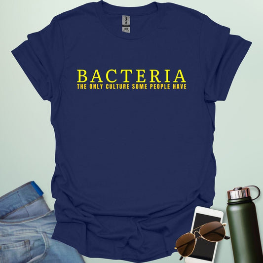 A navy blue t-shirt with the text 'BACTERIA THE ONLY CULTURE SOME PEOPLE HAVE' in yellow, bold font.
