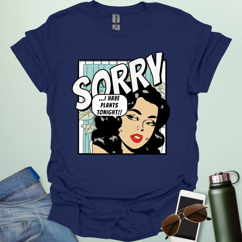 A navy blue t-shirt with a retro comic-book style illustration of a woman and the text 'SORRY ...I HAVE PLANTS TONIGHT!!'