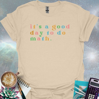 T-shirt with the math quote 'It's a good day to do math.' printed in a bold, simple font.