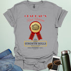 Grammar's Synonym Rolls t-shirt featuring a red ribbon award for fresh cinnamon rolls. Ideal funny gift for English teachers, writers, and grammar nerds.