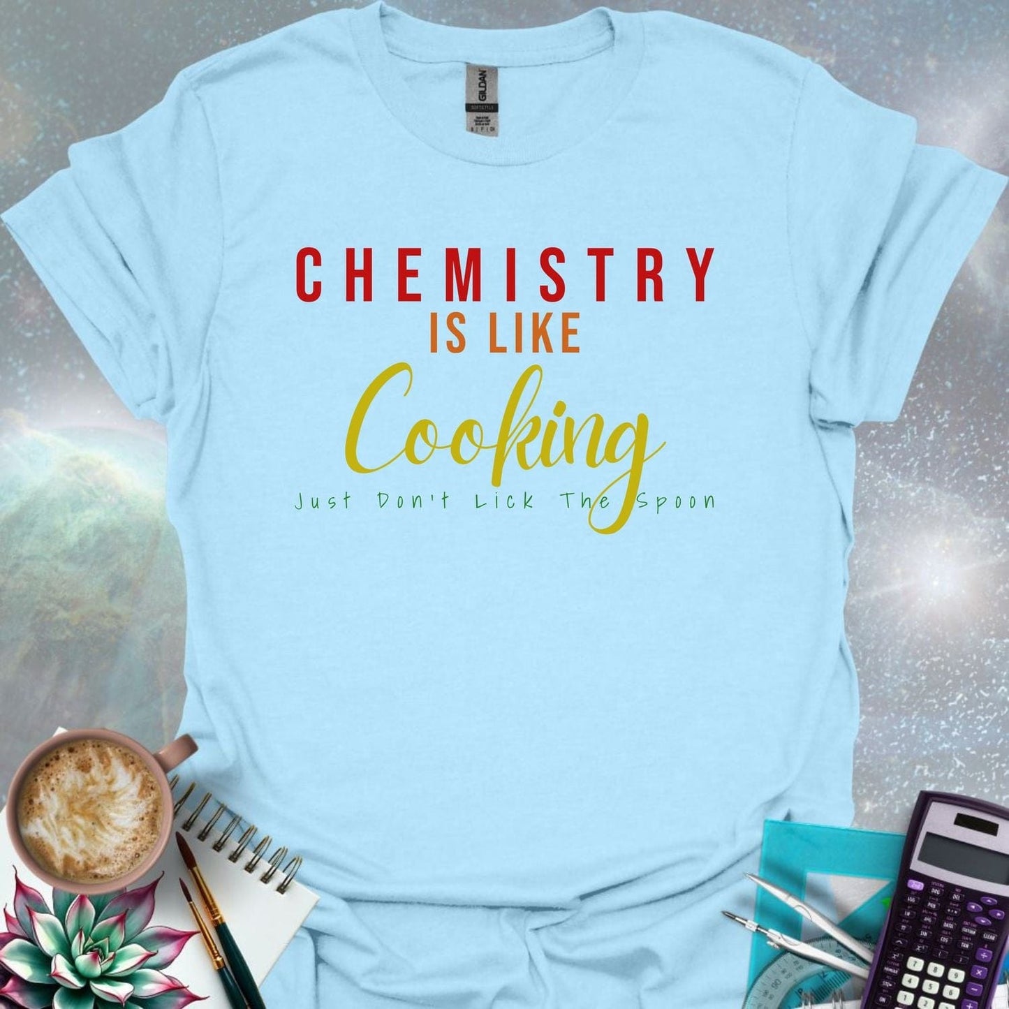 The text 'CHEMISTRY IS LIKE COOKING - JUST DON'T LICK THE SPOON' in a stylized font.