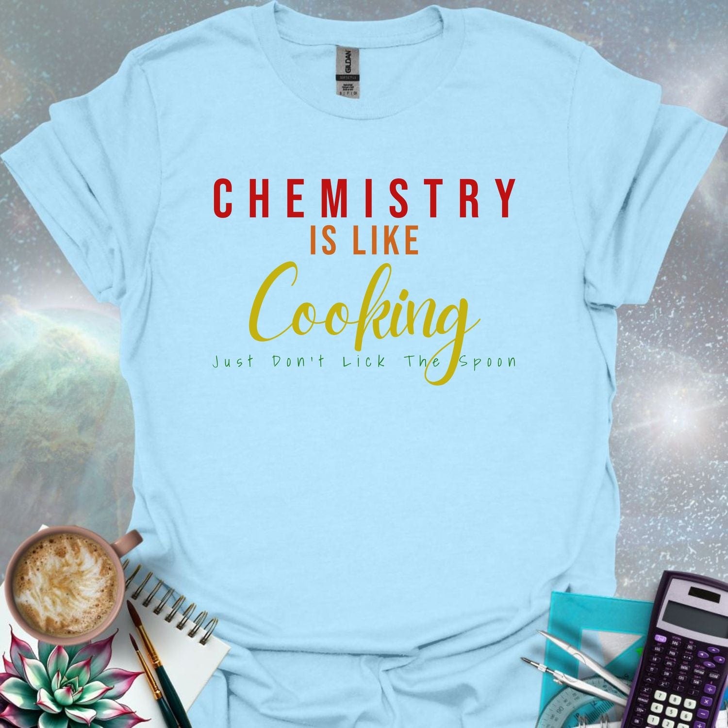 The text 'CHEMISTRY IS LIKE COOKING - JUST DON'T LICK THE SPOON' in a stylized font.