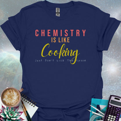 The text 'CHEMISTRY IS LIKE COOKING - JUST DON'T LICK THE SPOON' in a stylized font.