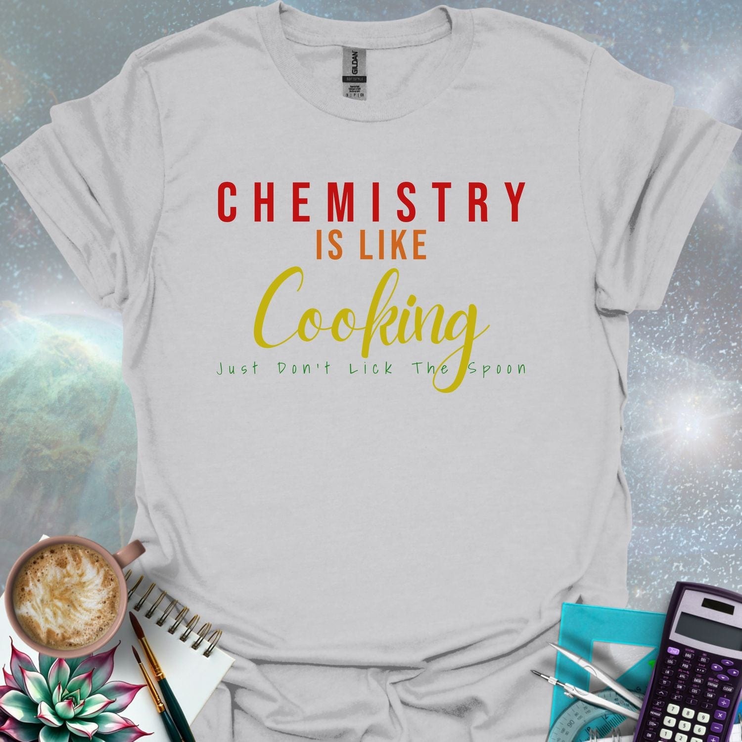 The text 'CHEMISTRY IS LIKE COOKING - JUST DON'T LICK THE SPOON' in a stylized font.