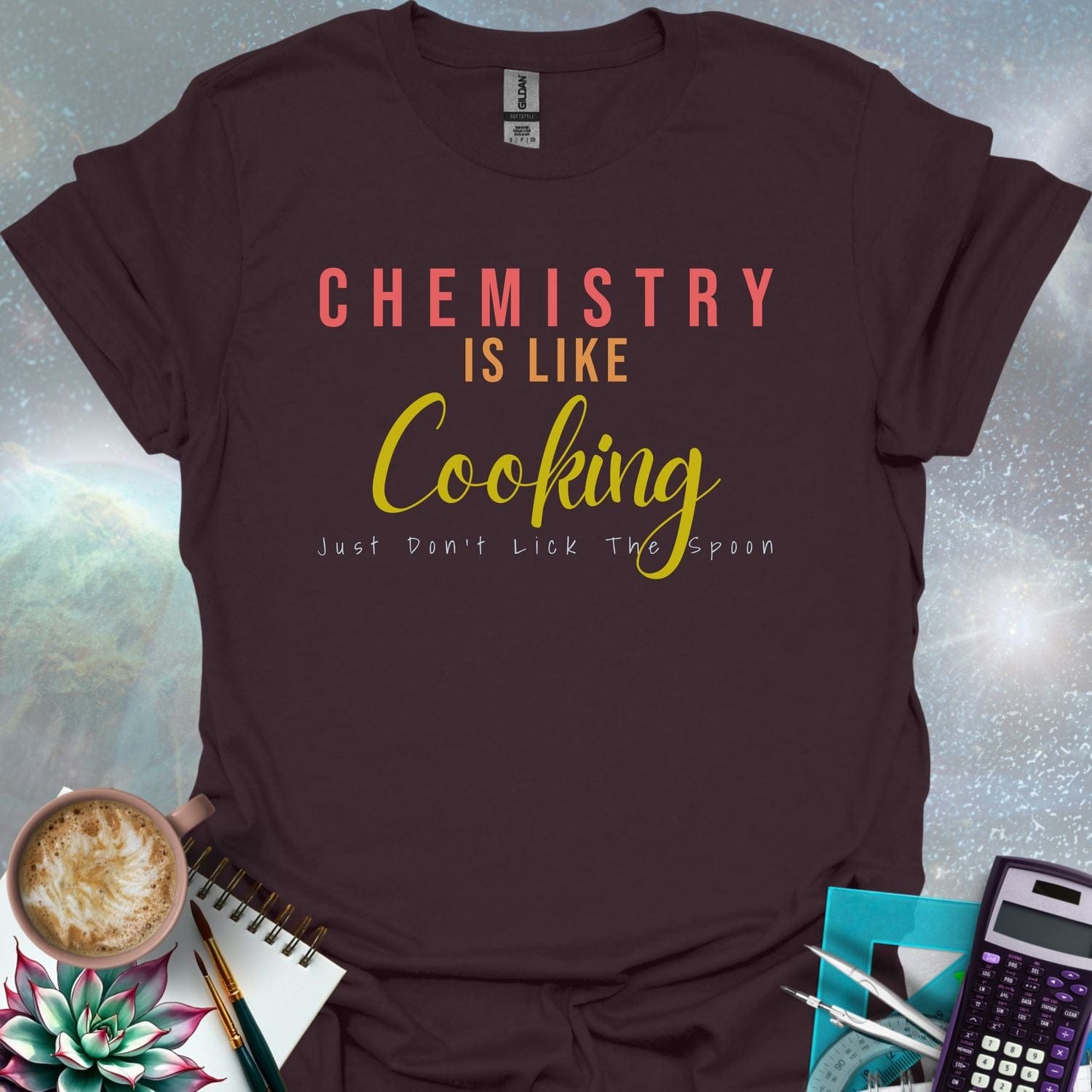 The text 'CHEMISTRY IS LIKE COOKING - JUST DON'T LICK THE SPOON' in a stylized font.