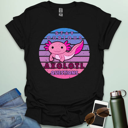 A black t-shirt with a cute axolotl in a circular design and the text 'Stay Curious Axolotl Questions.'