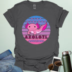 A charcoal grey t-shirt with a cute axolotl in a circular design and the text 'Stay Curious Axolotl Questions.'
