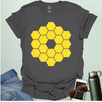 A yellow icon representing the James Webb Space Telescope's hexagonal mirror array.