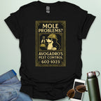 A black t-shirt designed like a vintage pest control ad with a mole holding a beaker and the text 'Mole Problems? Avogadro's Pest Control' and the number 602-1023.