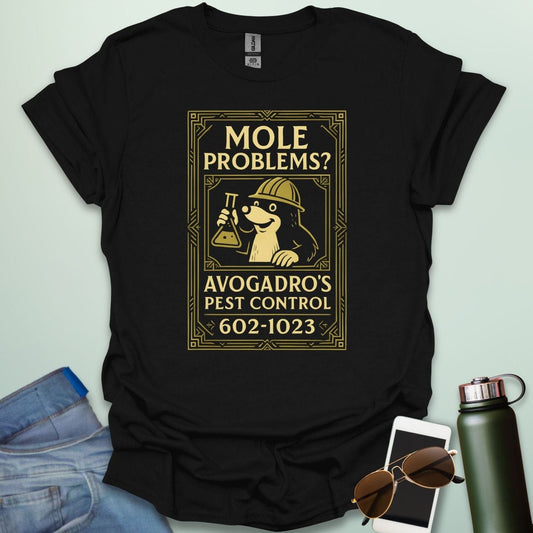 A black t-shirt designed like a vintage pest control ad with a mole holding a beaker and the text 'Mole Problems? Avogadro's Pest Control' and the number 602-1023.