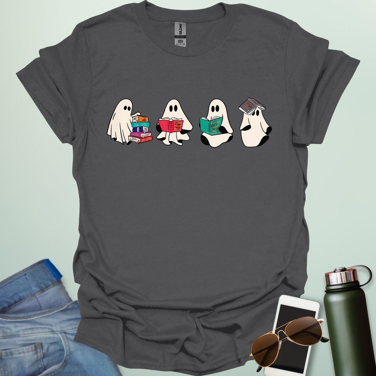 Ghost Readers t-shirt with ghost reading books graphic — spooky Halloween tee for book lovers, teachers, and readers who love a good ghost story.