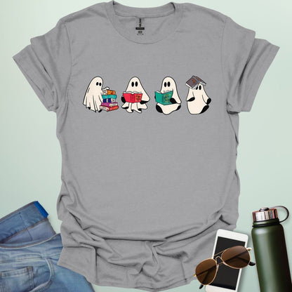 Ghost Readers t-shirt with ghost reading books graphic — spooky Halloween tee for book lovers, teachers, and readers who love a good ghost story.