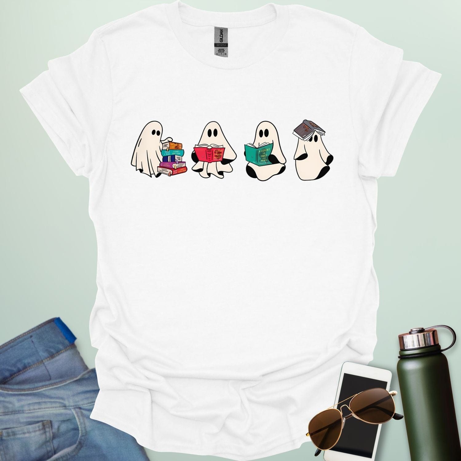 Ghost Readers t-shirt with ghost reading books graphic — spooky Halloween tee for book lovers, teachers, and readers who love a good ghost story.
