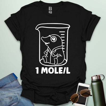 A funny chemistry t-shirt featuring a cartoon mole inside a science beaker. The design includes the text '1 MOLE/L,' a clever pun for chemists and science students.