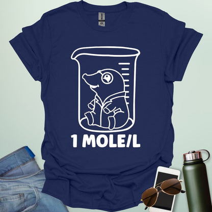 A funny chemistry t-shirt featuring a cartoon mole inside a science beaker. The design includes the text '1 MOLE/L,' a clever pun for chemists and science students.