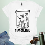 A funny chemistry t-shirt featuring a cartoon mole inside a science beaker. The design includes the text '1 MOLE/L,' a clever pun for chemists and science students.