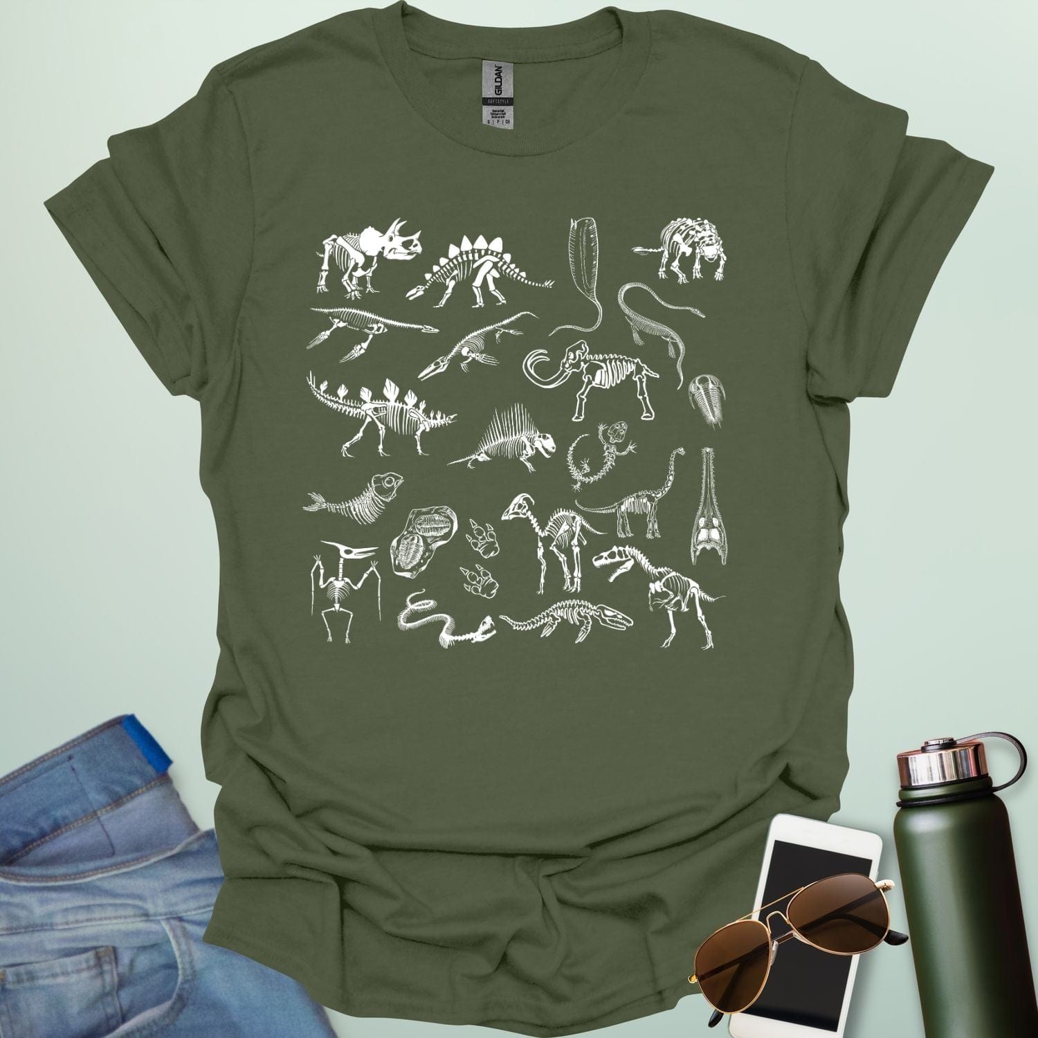 A collage of various fossil skeletons, including dinosaurs, prehistoric mammals, and invertebrates, arranged in a square or block pattern.