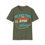 Retro illustration featuring text reading 'WE HAVE TIME FOR ONE MORE STOP' above a vintage car loaded with luggage parked next to a roadside historical marker signpost.