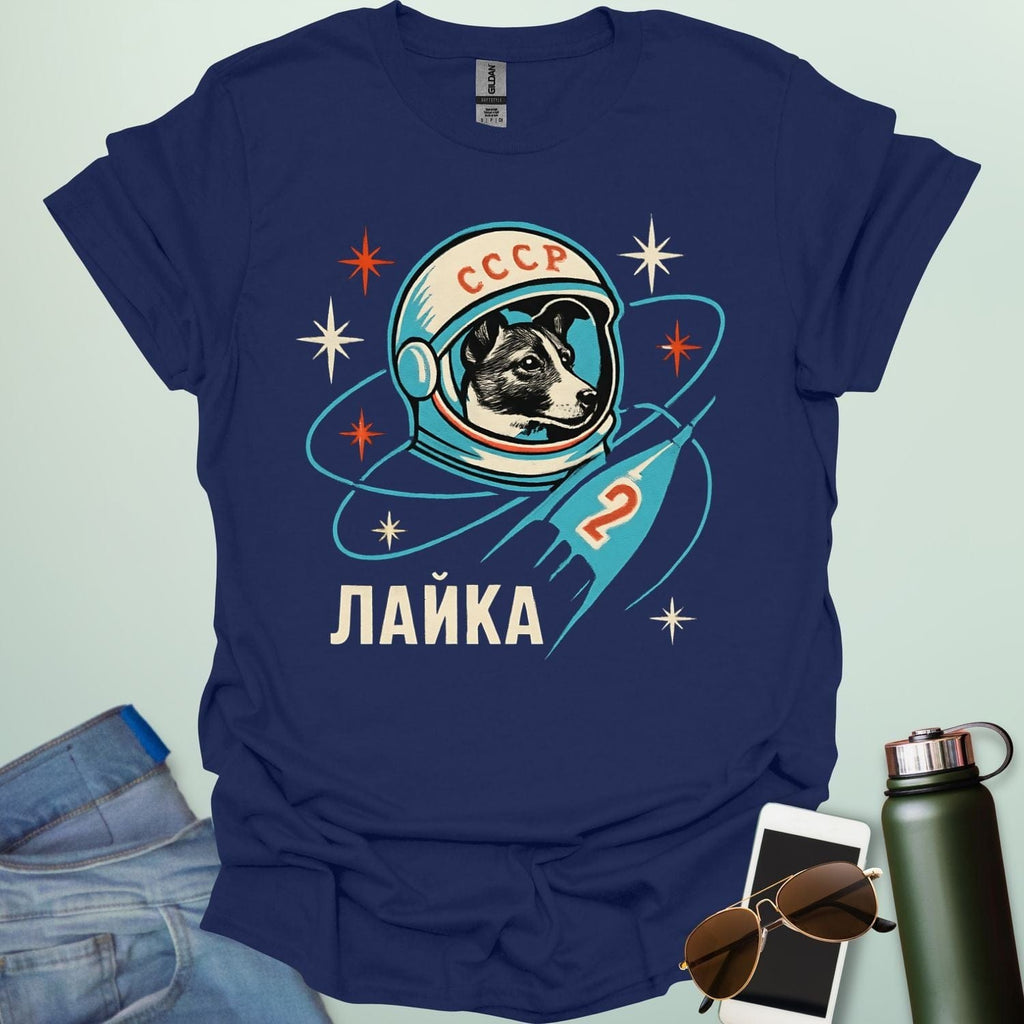 Laika First Dog in Space t-shirt with retro Soviet cosmonaut design featuring Laika in a helmet and rocket ship illustration.