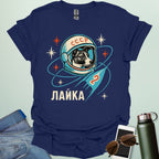 Laika First Dog in Space t-shirt with retro Soviet cosmonaut design featuring Laika in a helmet and rocket ship illustration.