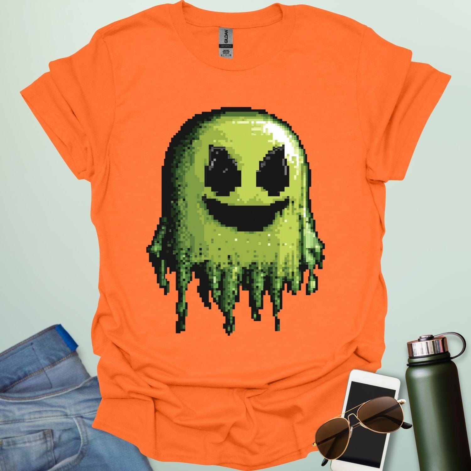 Pixel Ghost t-shirt featuring 8-bit style ghost graphic — a retro video-game inspired design for coders, gamers and lovers of spooky fun.